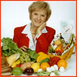 Lori with a selection of healthy foods